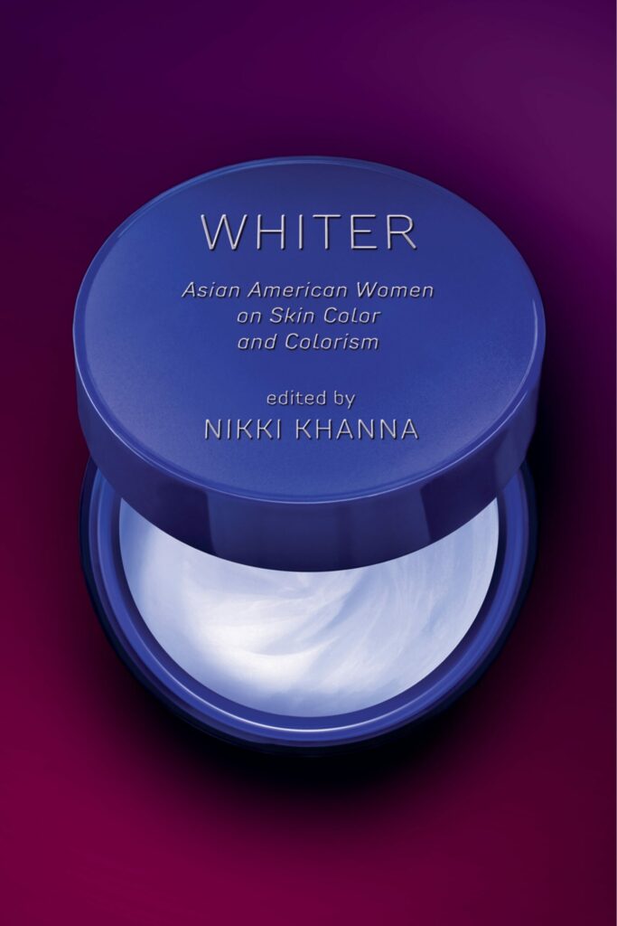 On the cover of Whiter, there is a compact with face powder.