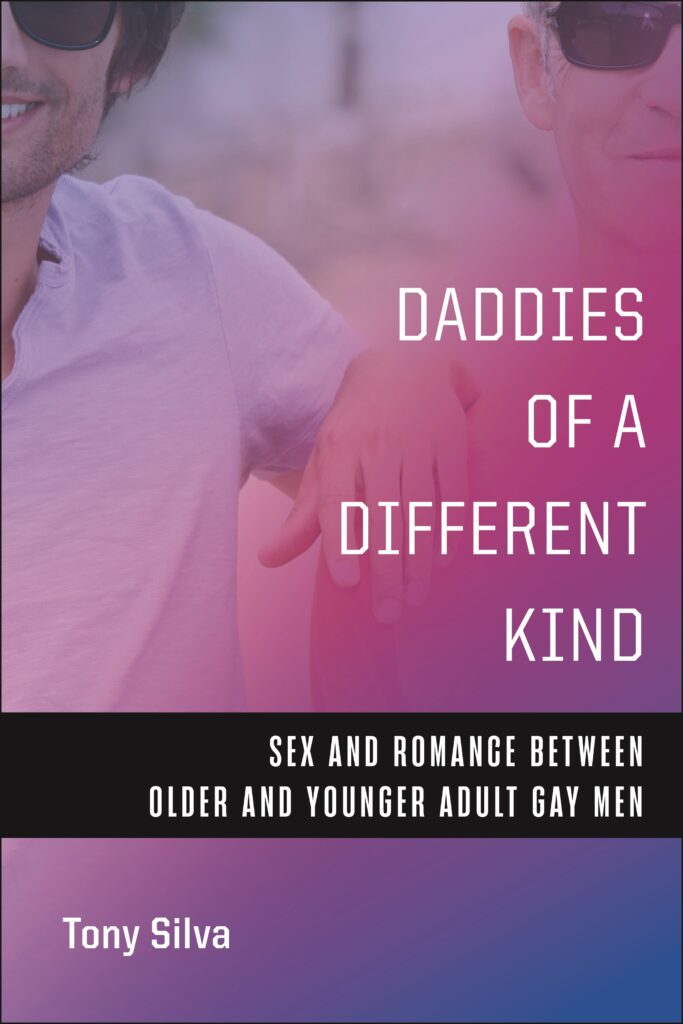 A book cover with two men, one in his 30s, the other in his 50s, slightly blurry behind a pink and blue haze of color. The title "Daddies of a Different Kind" is overlaid in white type. 