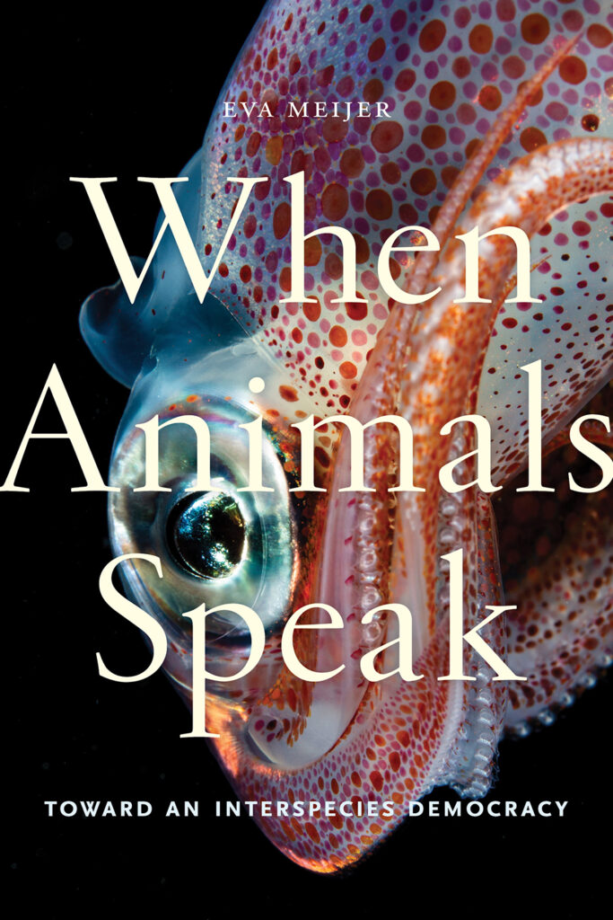 On the cover of When Animals Speak, a red-spotted octopus swims against a black background.