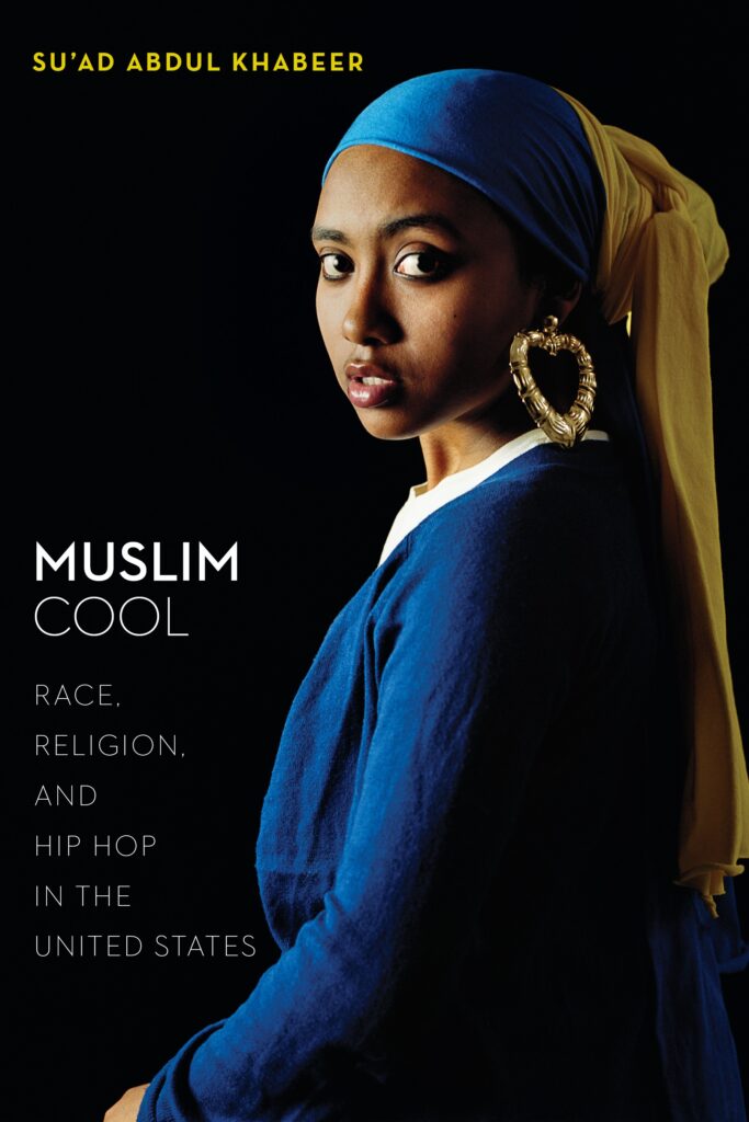 Muslim Cool: Race, Religion, and Hip Hop in the United States by Su'ad Abdul Khabeer, there is a photo inspired by the painting The Woman in the Pearl Earring. Instead, the woman wears a heart-shaped hoop.